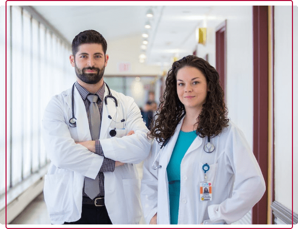 SGU Grads in Hallway