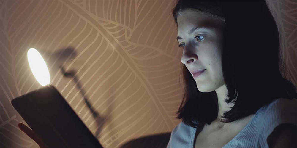 Student working on medical school application materials at desk