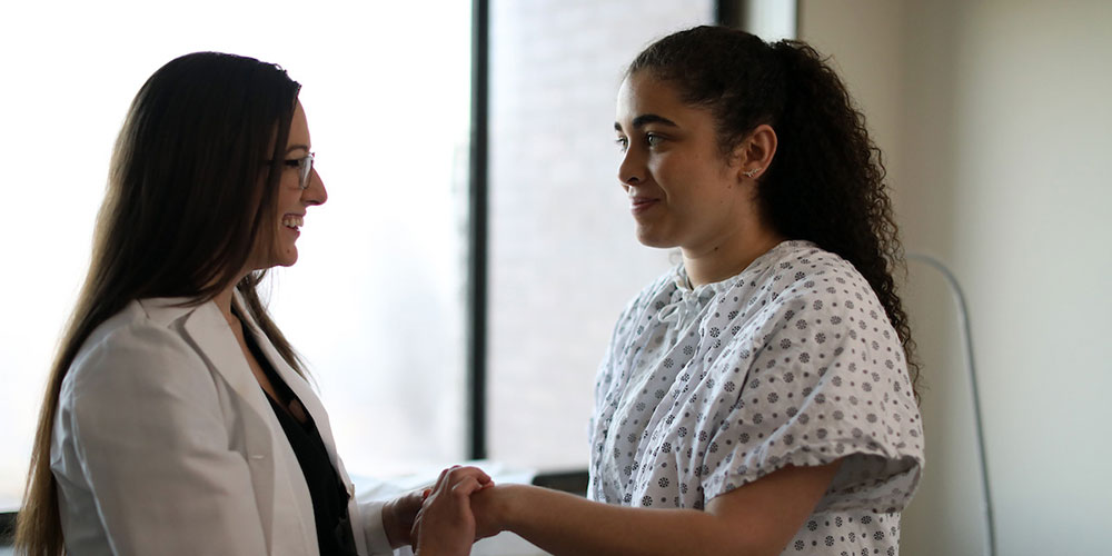 Doctor Assuring Patient