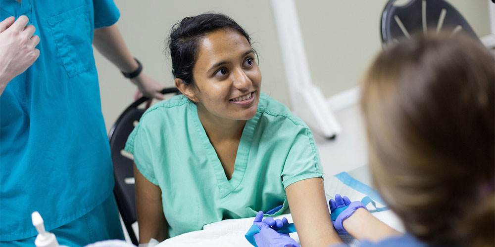 SGU Graduate with Patient