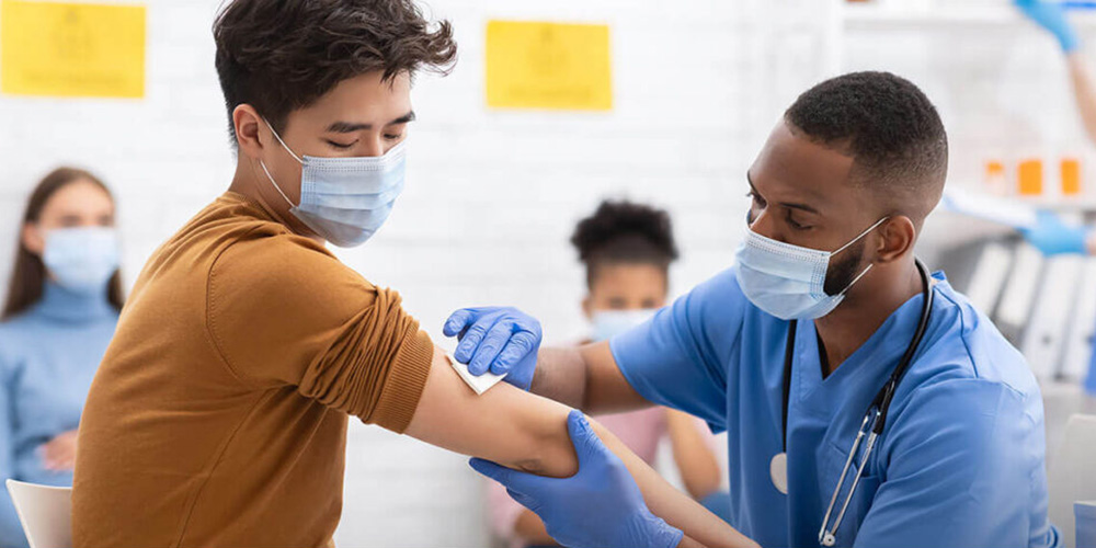 Dr. administering vaccine