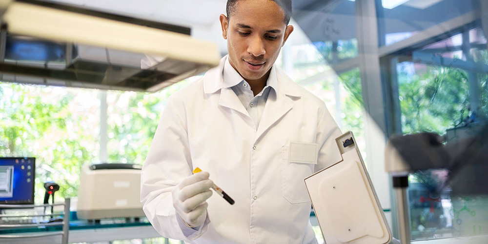Forensic pathologist handles samples in a lab