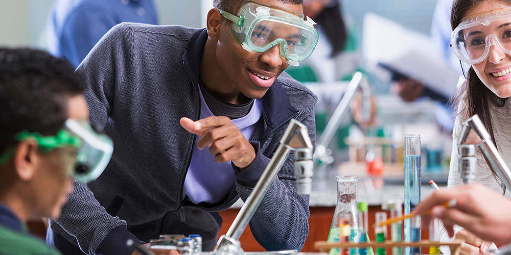 High school students conducting science experience