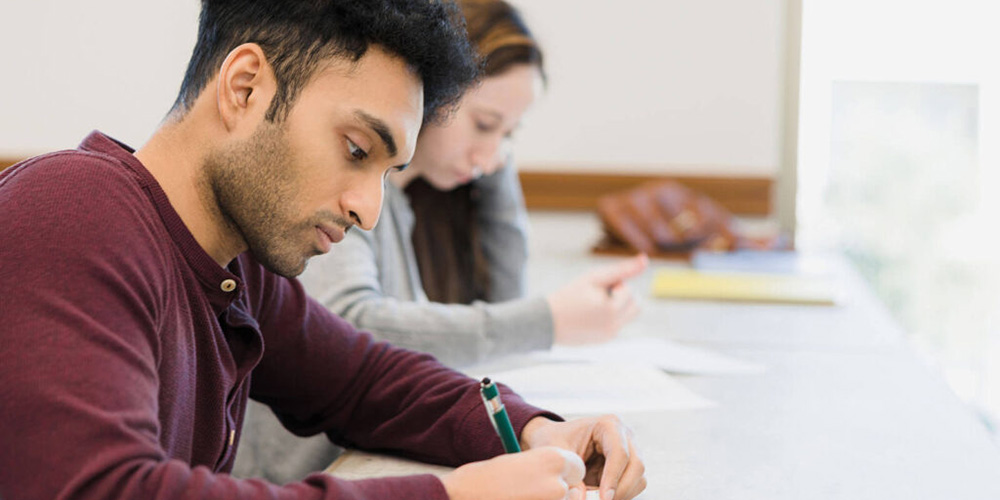 Pre med student taking the MCAT exam