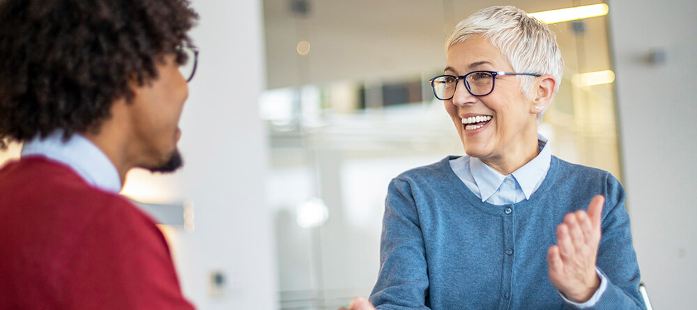 Pre-med student practicing medical school interviews with faculty mentor