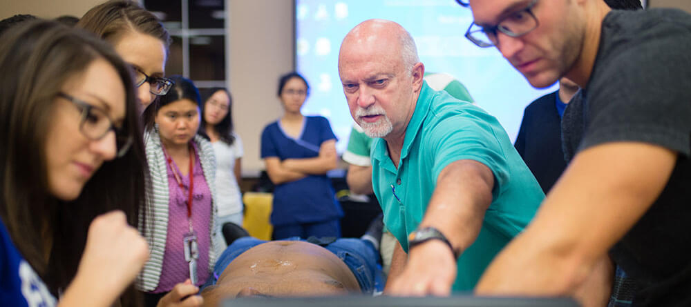 SGU students learn about ultrasound imaging in a group setting