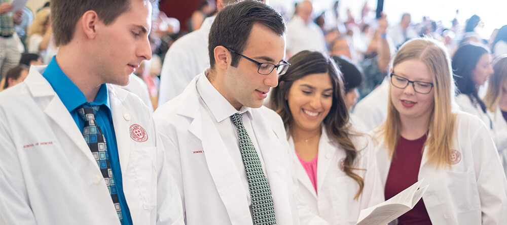 SGU Students celebrating White Coat Ceremony
