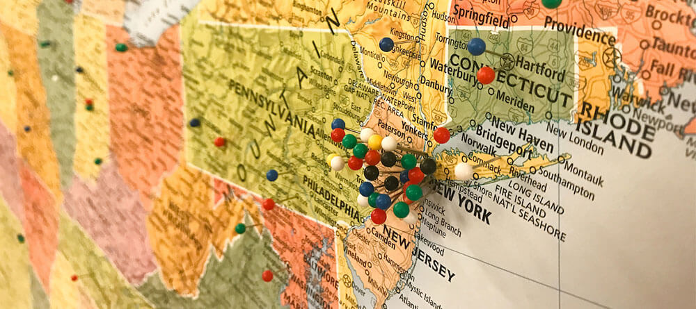 Close up of US map with pins showing IMG residency locations