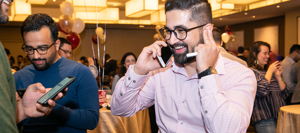 Student celebrating on phone