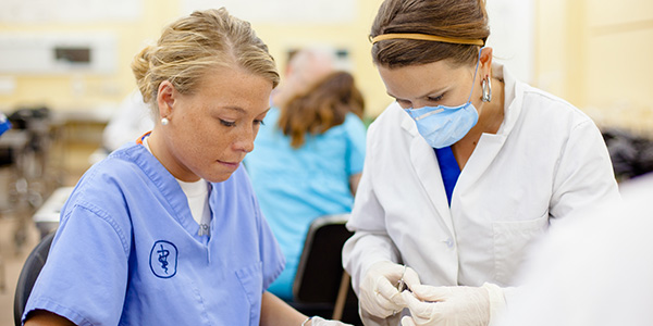 SGU student suturing