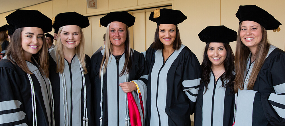 Group of SGU veterinary medicine graduates at graduation ceremony