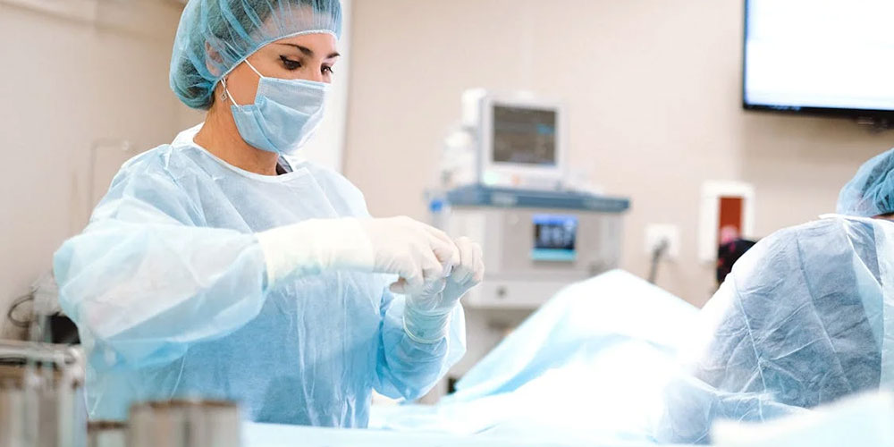 Doctor administers anesthesia