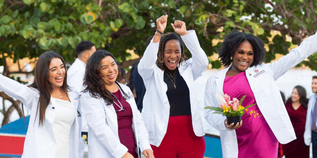 Future doctors celebrating at white coat ceremony
