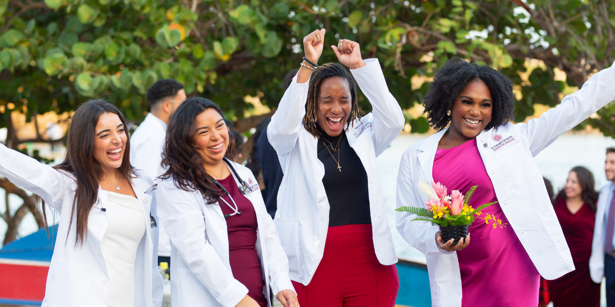 Future doctors celebrating at white coat ceremony
