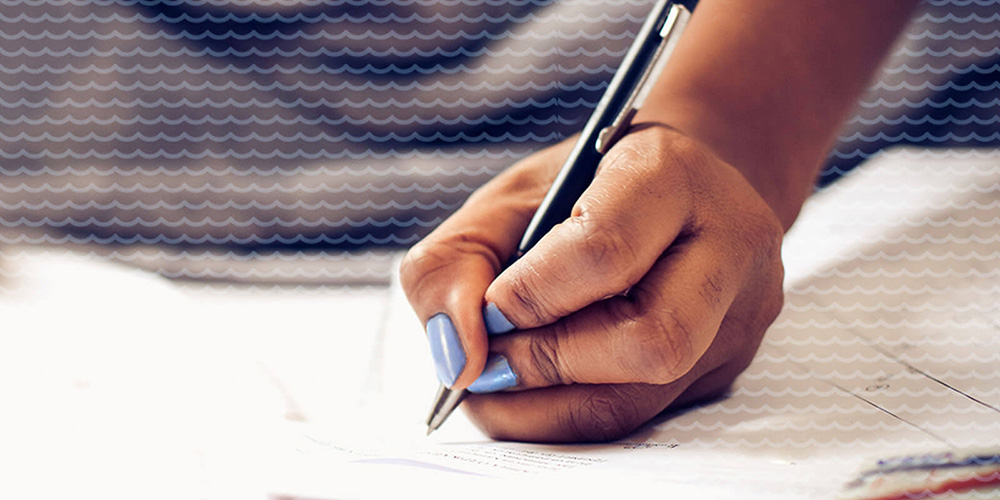 Woman's hand writing