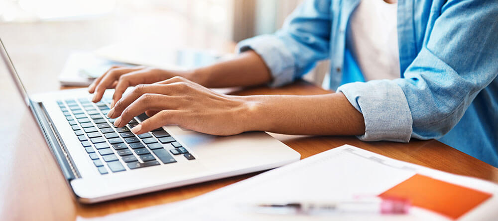 A potential medical school student works on their supplemental application material