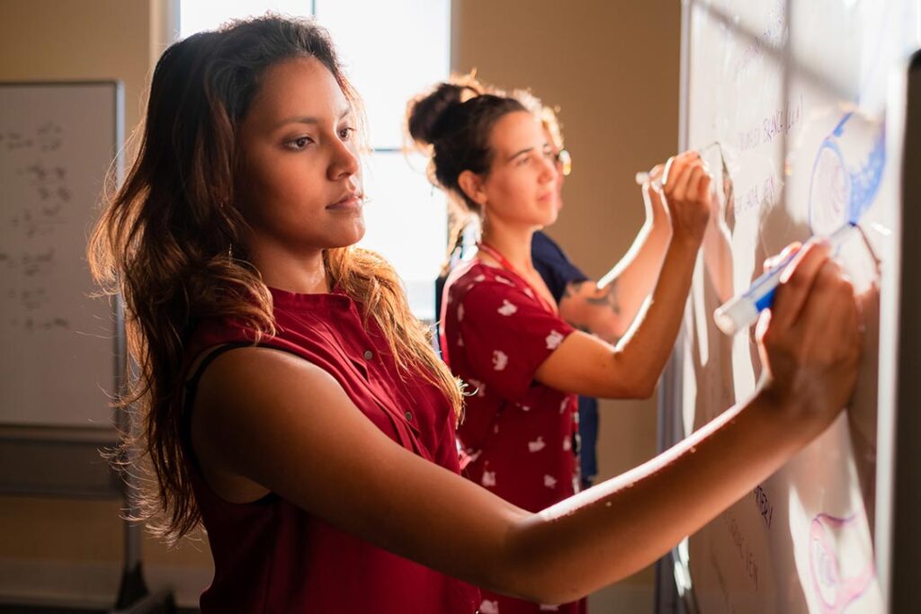 Students using whiteboard