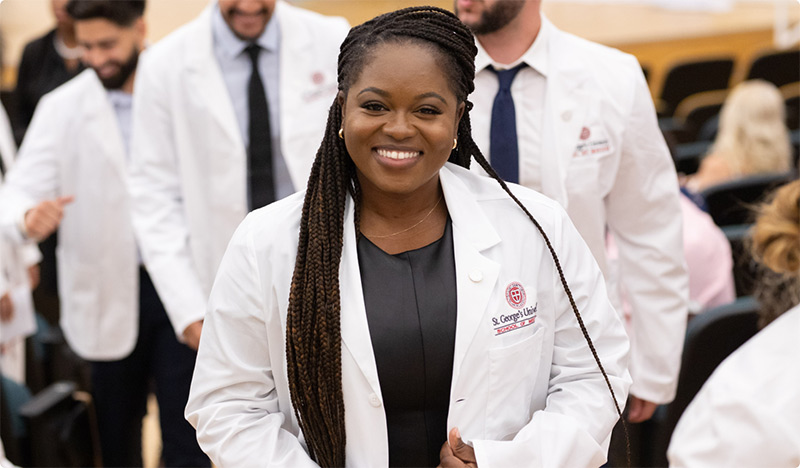 SGU Grad in Whitecoat