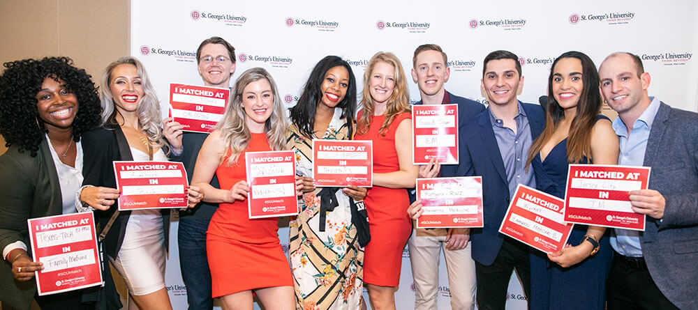 SGU students pose for a photo as they celebrate receiving their residency matches