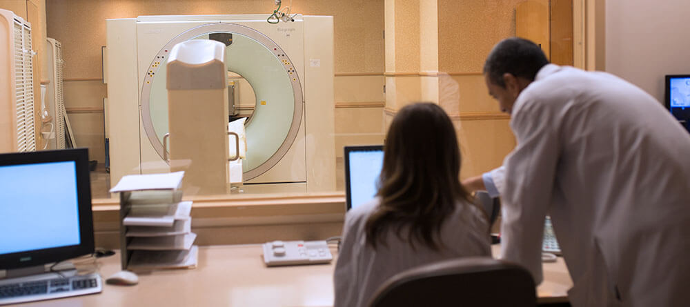 Two radiologists conducting diagnostic imagery tests